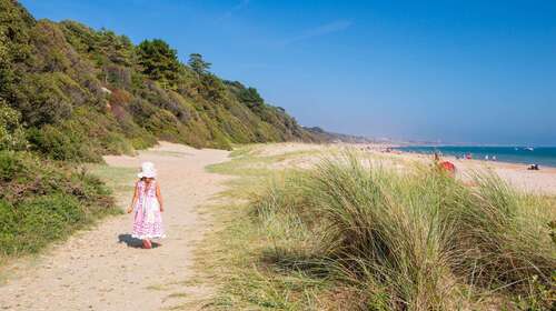 A child on the beach on holiday